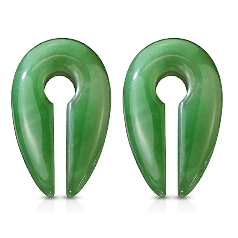 A pair of green stretched ear hangers pictured against a white background.