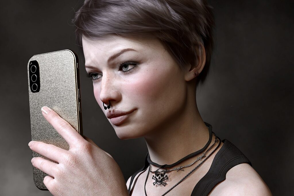 A young goth woman with a septum piercing looking at her phone.